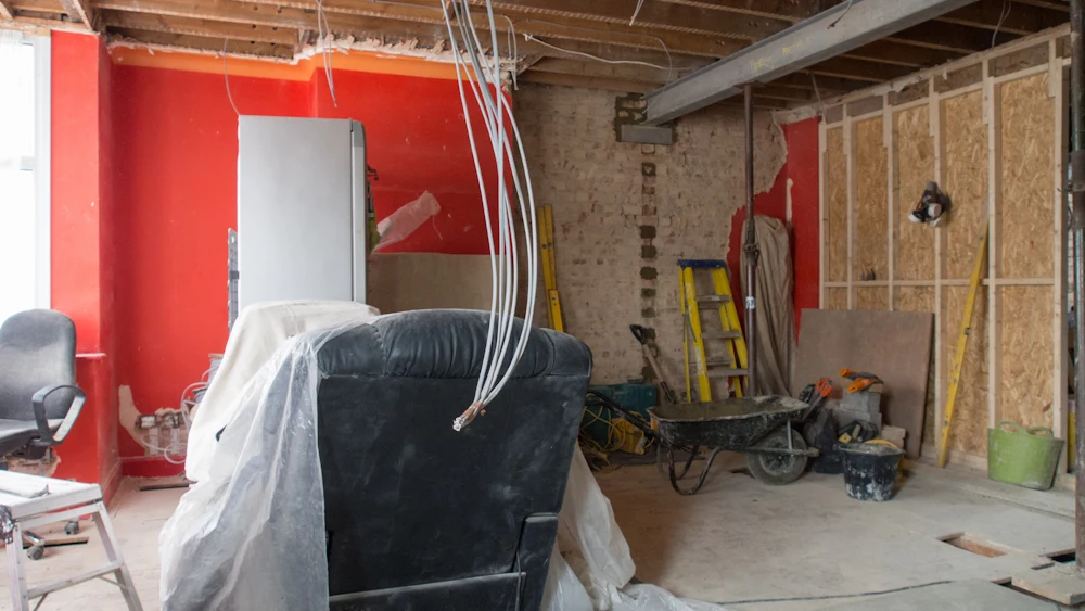 A room opened up for a renovation with new wiring in the walls.