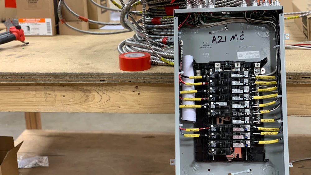 A new residential breaker panel wired with fresh circuits.